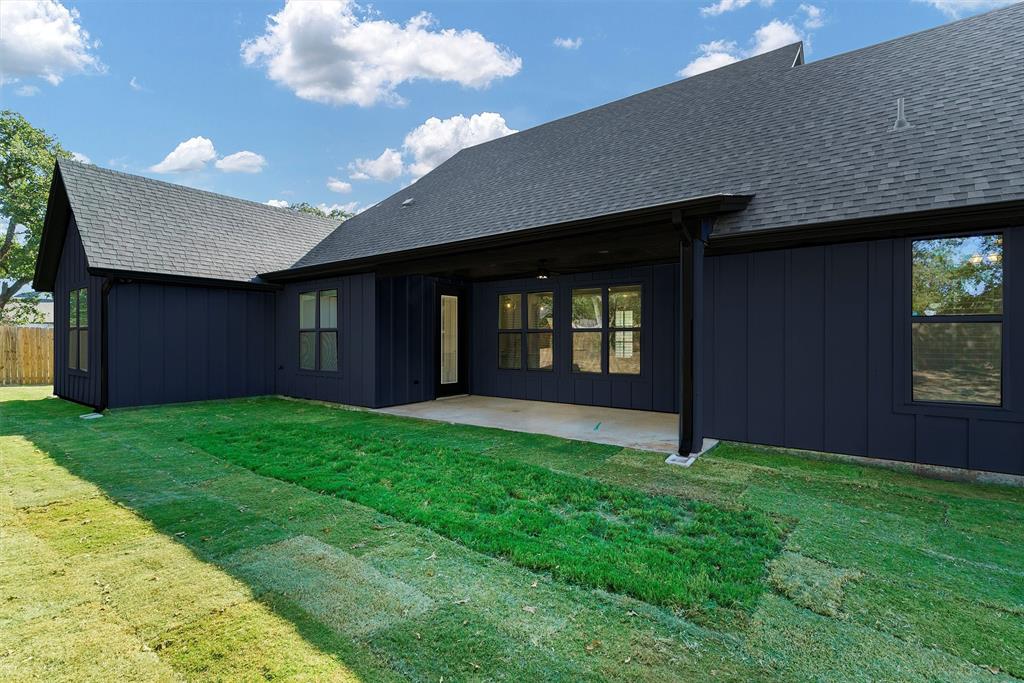2029 Rattler Way Tolar, TX 76476 - Photo 28 of 28 a view of an house with backyard porch and entertaining space