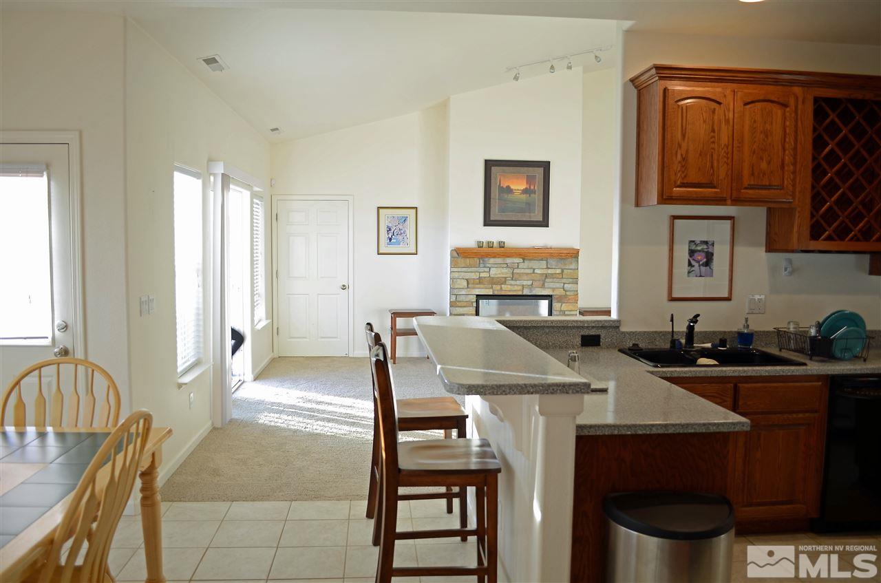 5100 Wayside Road Reno, NV 89510 - Photo 20 of 25 a view of a dining room with furniture and a window