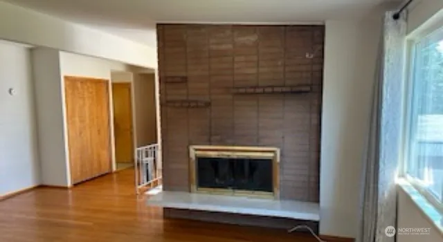 a living room with a fireplace