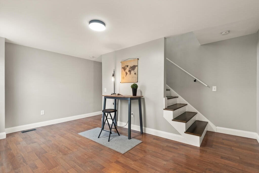 14 Middle Street Wakefield, MA 01880 - Photo 13 of 34 a view of entryway with wooden floor