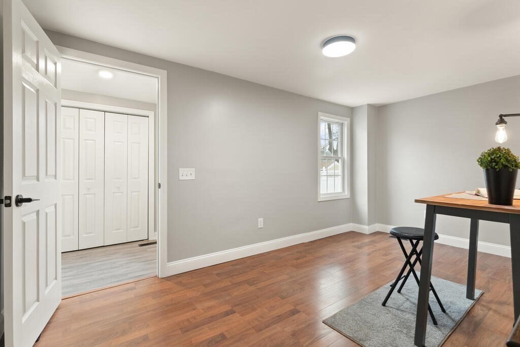 14 Middle Street Wakefield, MA 01880 - Photo 14 of 34 a view of room with furniture and wooden floor