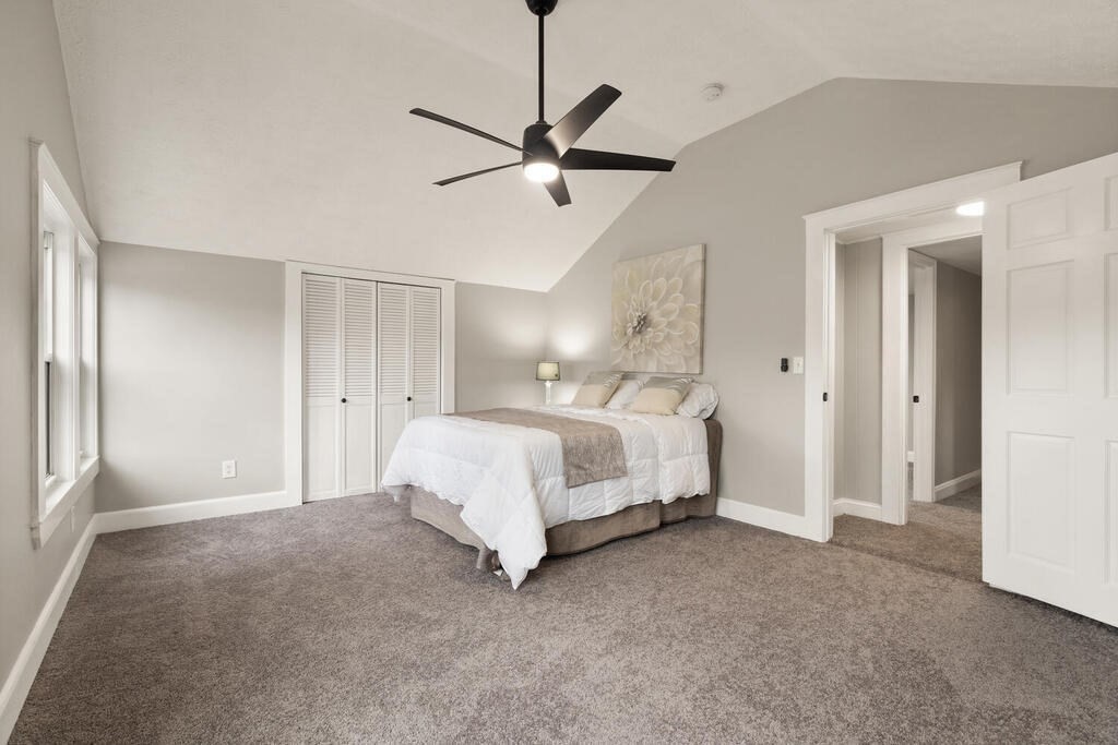 14 Middle Street Wakefield, MA 01880 - Photo 22 of 34 a bed room with a bed and a ceiling fan