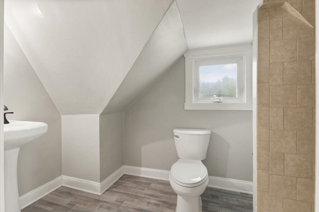 14 Middle Street Wakefield, MA 01880 - Photo 25 of 34 a bathroom with a toilet sink and mirror