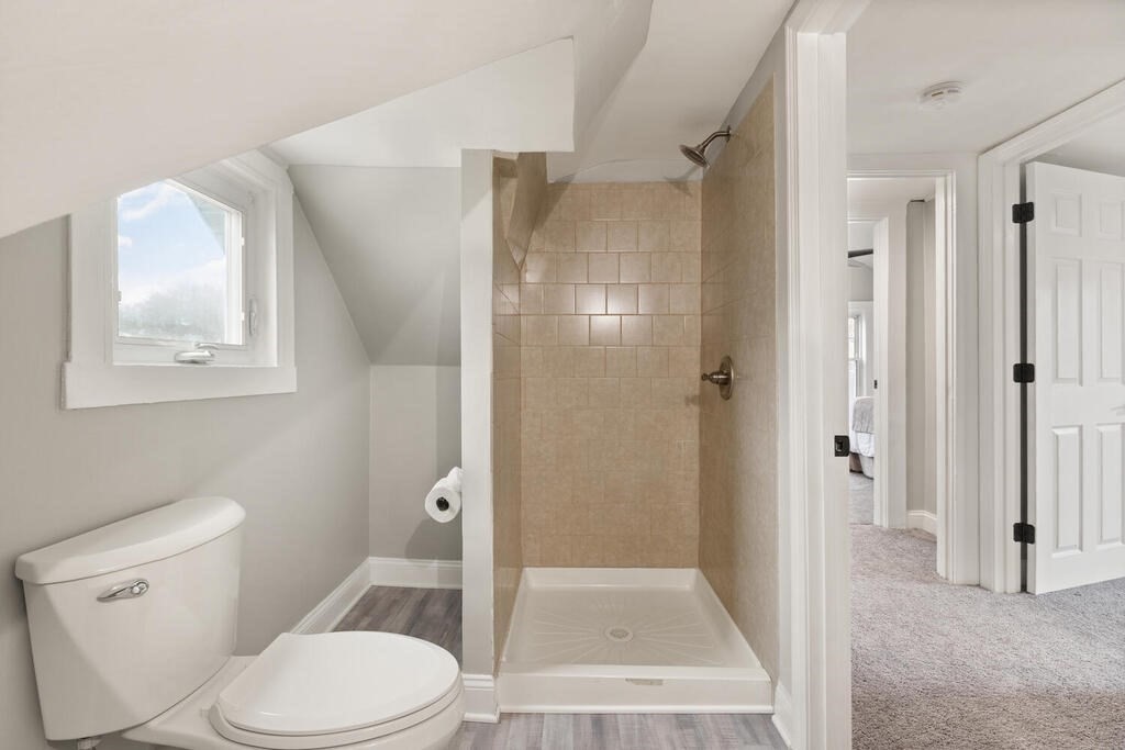 14 Middle Street Wakefield, MA 01880 - Photo 27 of 34 a bathroom with a toilet and a shower