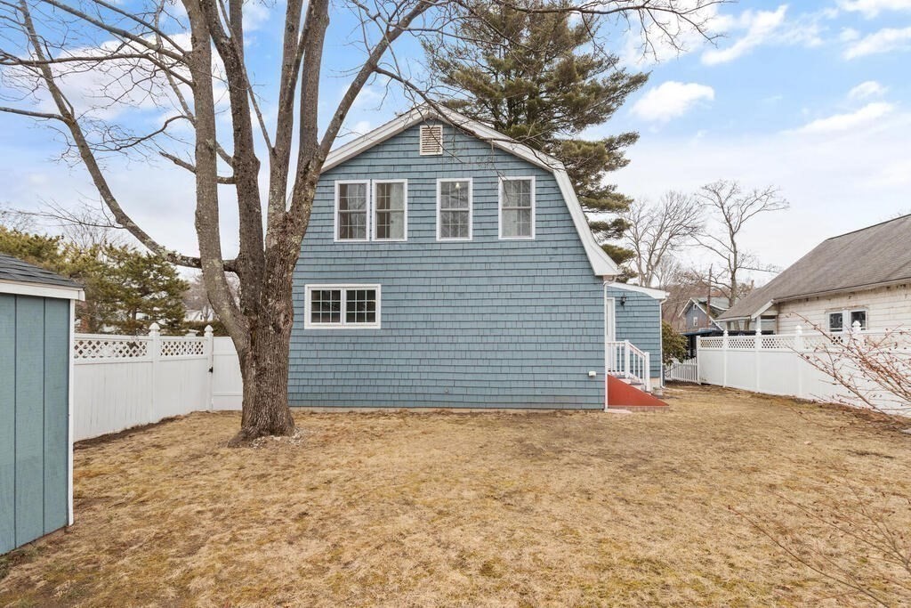 14 Middle Street Wakefield, MA 01880 - Photo 30 of 34 a view of a house with a yard covered in snow