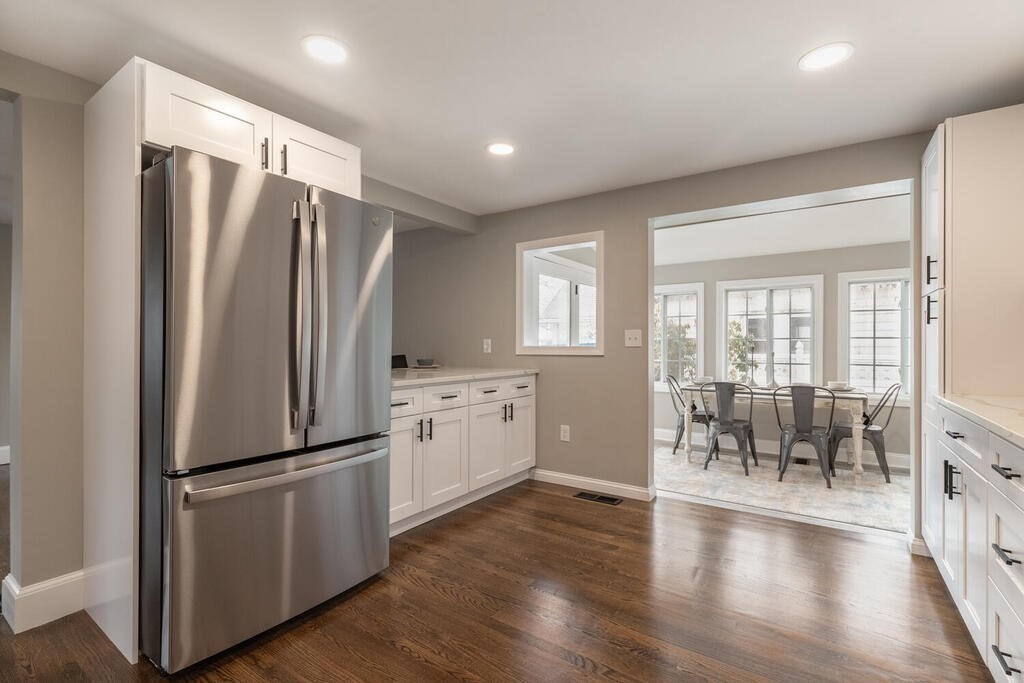 14 Middle Street Wakefield, MA 01880 - Photo 32 of 34 a kitchen with stainless steel appliances a refrigerator and wooden floor