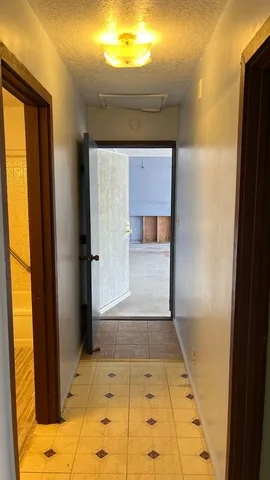 a view of entryway with a front door