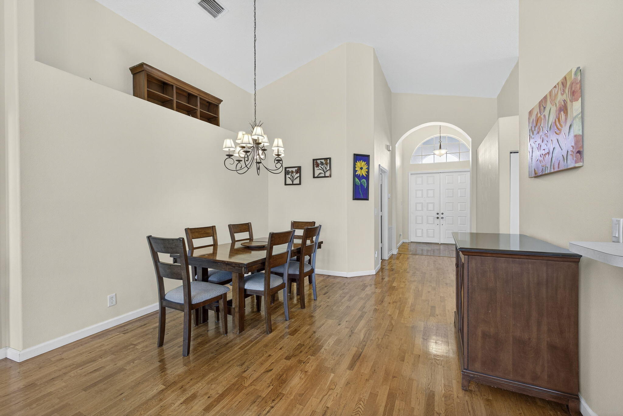 11061 Laurel Walk Road Wellington, FL 33449 - Photo 14 of 67 a view of a dining room with furniture and chandelier