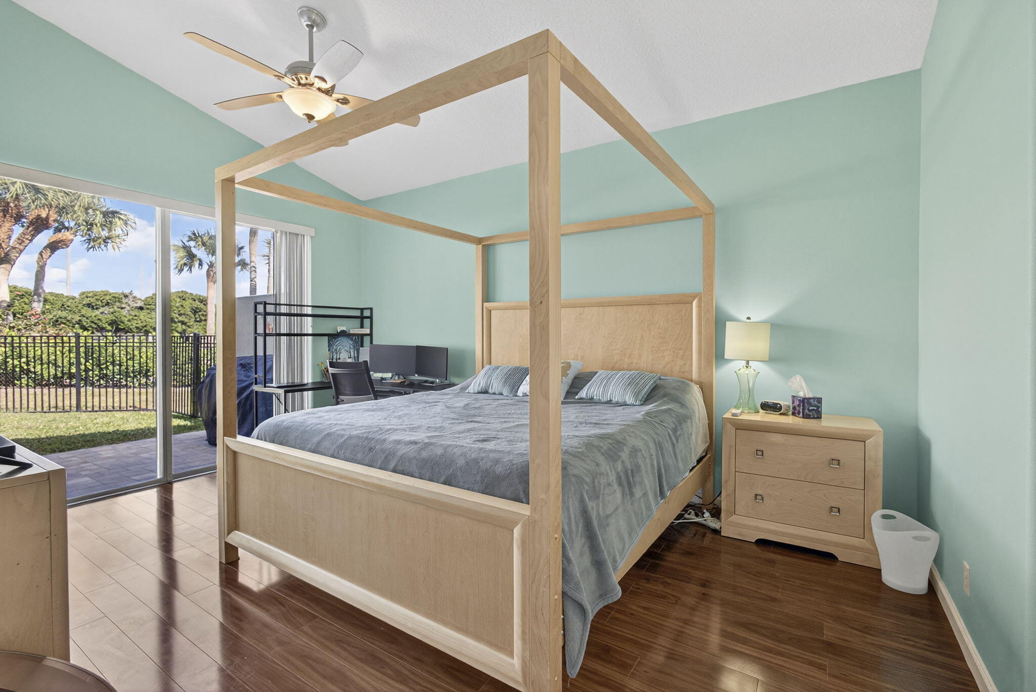 11061 Laurel Walk Road Wellington, FL 33449 - Photo 21 of 67 a bed sitting in a bedroom next to a window