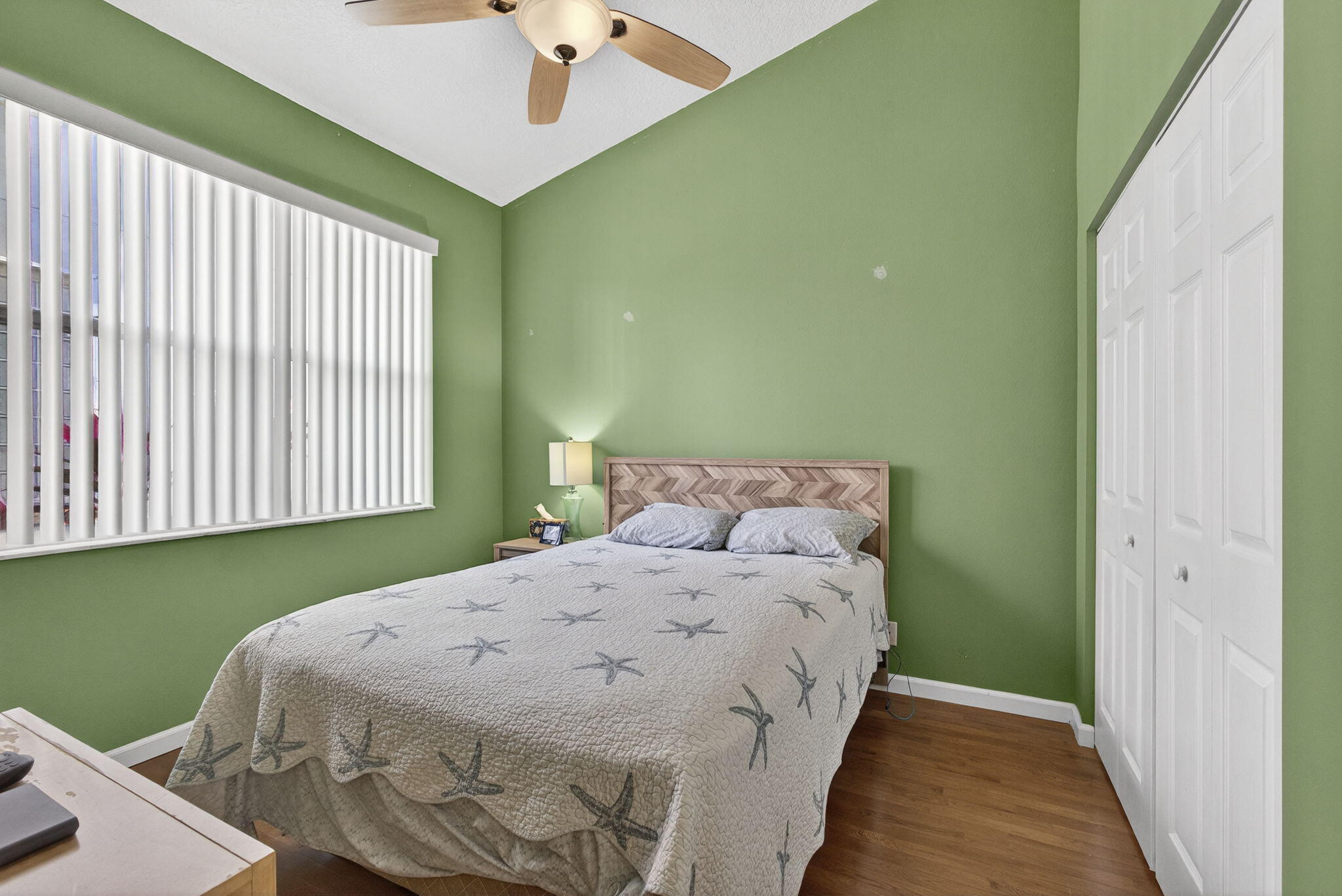 11061 Laurel Walk Road Wellington, FL 33449 - Photo 26 of 67 a bedroom with a bed and a window