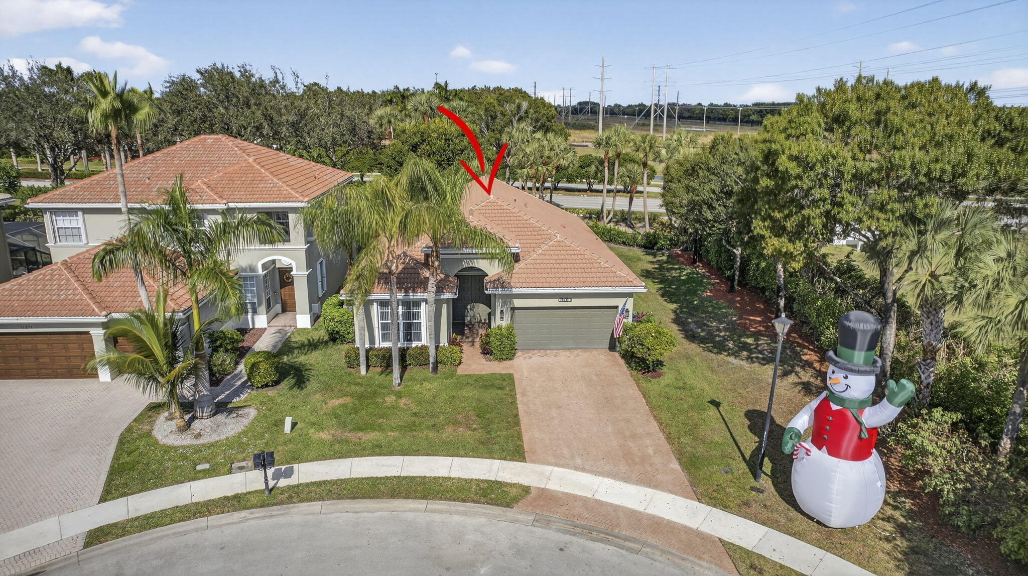 11061 Laurel Walk Road Wellington, FL 33449 - Photo 39 of 67 a view of a house with backyard and sitting area