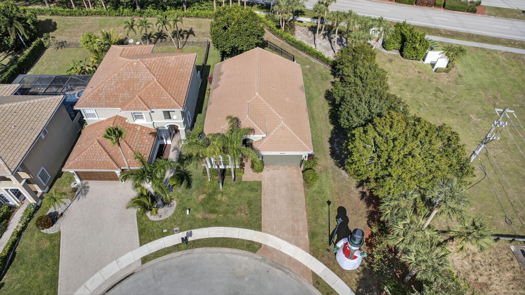 11061 Laurel Walk Road Wellington, FL 33449 - Photo 41 of 67 an aerial view of a house with a yard and lake view
