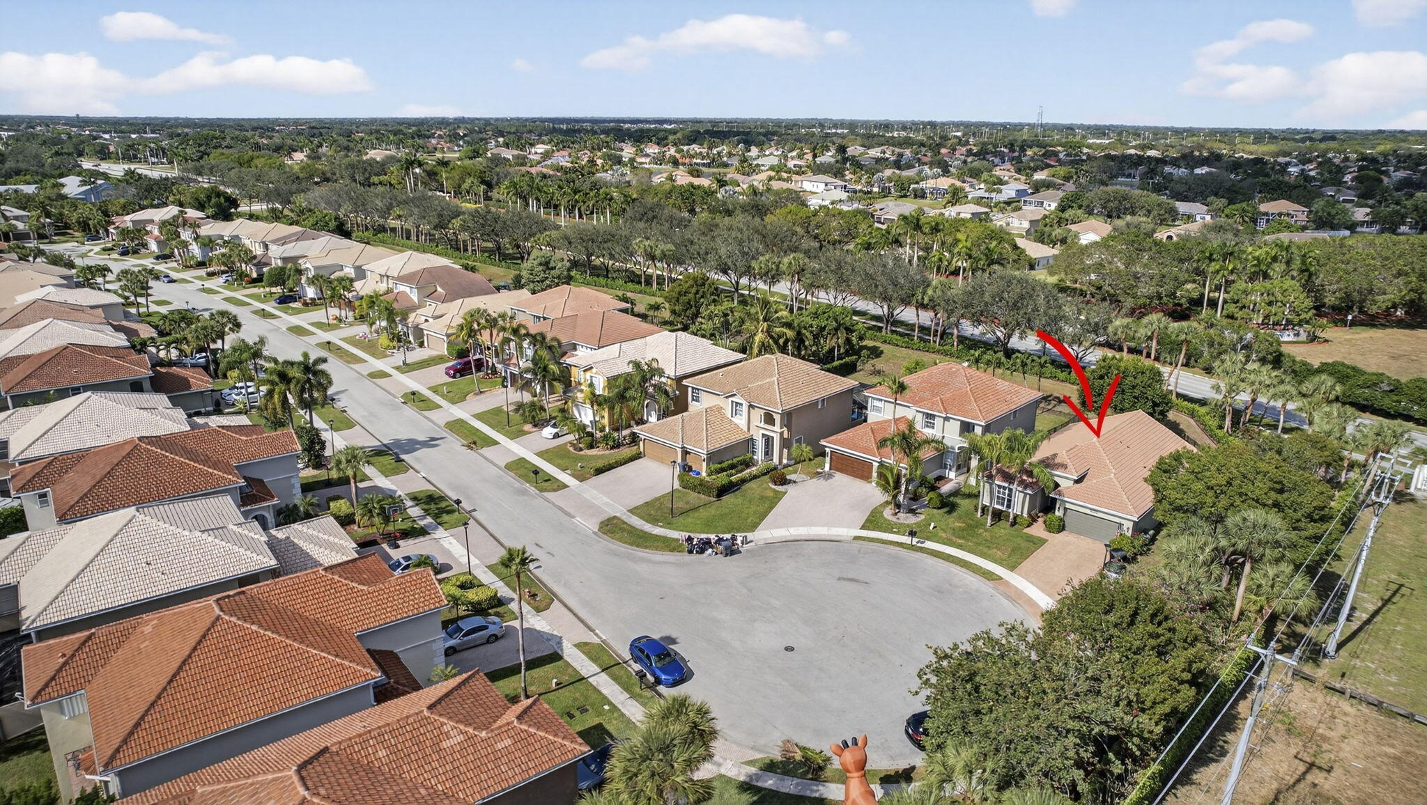 11061 Laurel Walk Road Wellington, FL 33449 - Photo 43 of 67 an aerial view of a city with lots of residential buildings