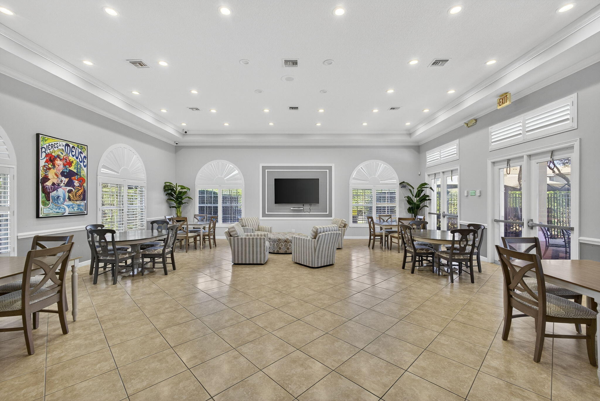 11061 Laurel Walk Road Wellington, FL 33449 - Photo 64 of 67 a living room with lots of furniture and a flat screen tv