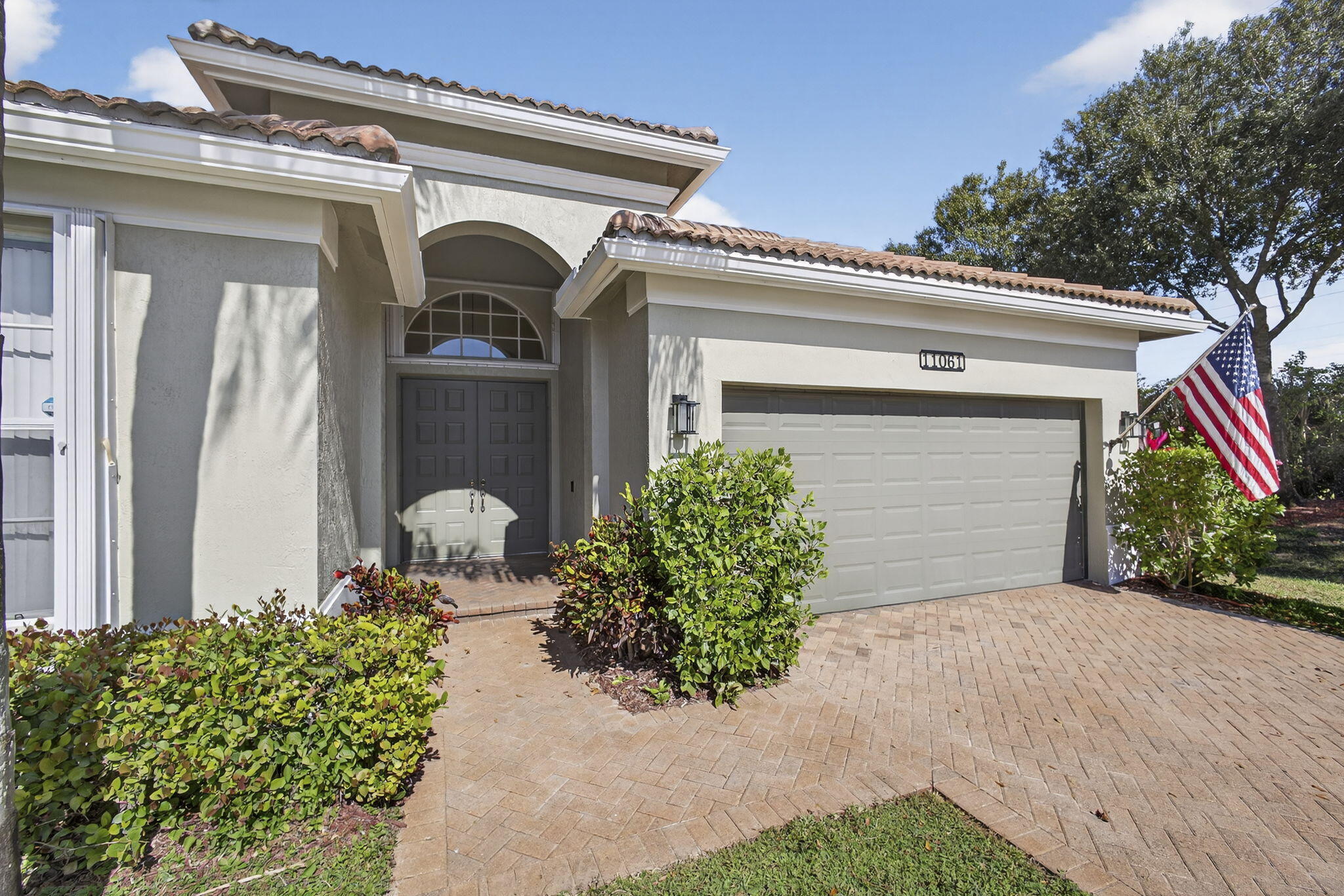 11061 Laurel Walk Road Wellington, FL 33449 - Photo 7 of 67 a front view of a house
