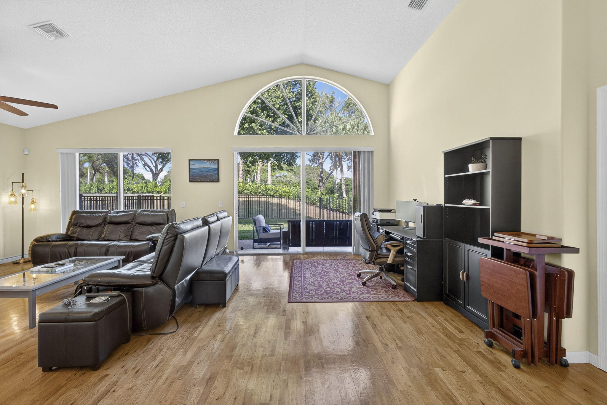 11061 Laurel Walk Road Wellington, FL 33449 - Photo 10 of 67 a living room with furniture and a flat screen tv
