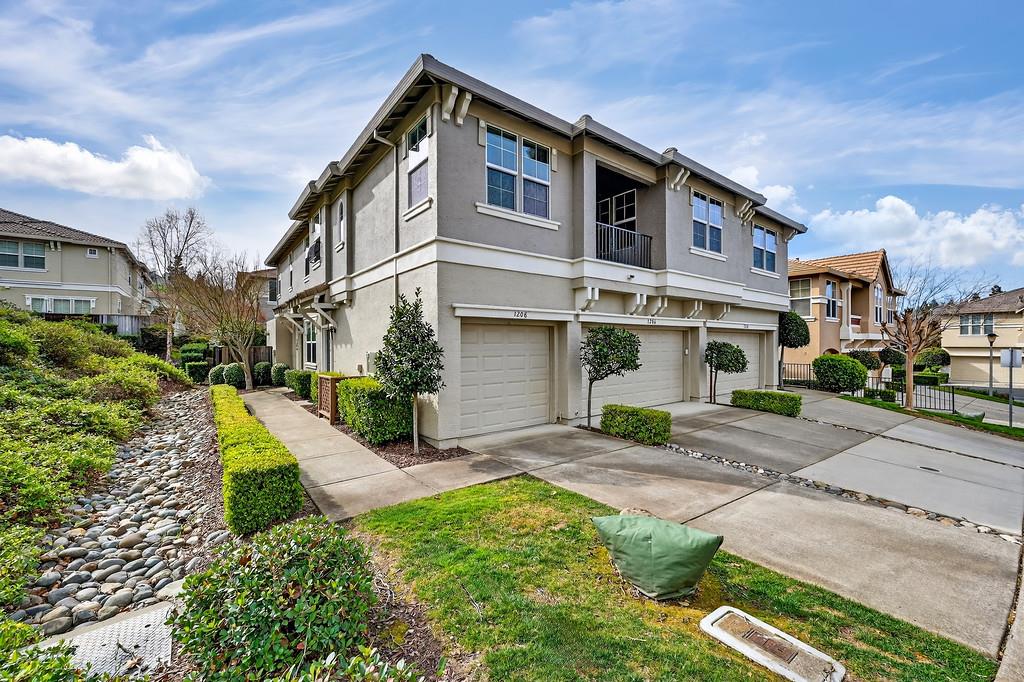 1208 Reading Way, Unit 80 Rocklin, CA 95765 - Photo 1 of 1 a view of a front of house with a yard