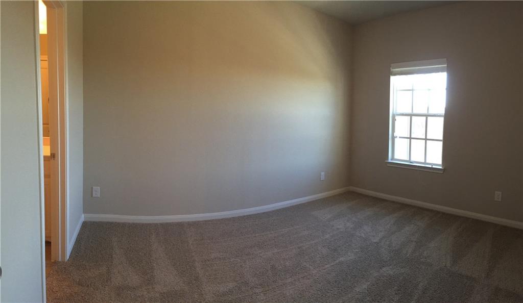 1017 Water Street Carrollton, TX 75007 - Photo 11 of 21 an empty room with windows
