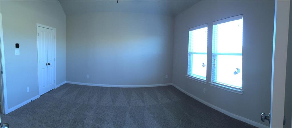 1017 Water Street Carrollton, TX 75007 - Photo 14 of 21 an empty room with a window