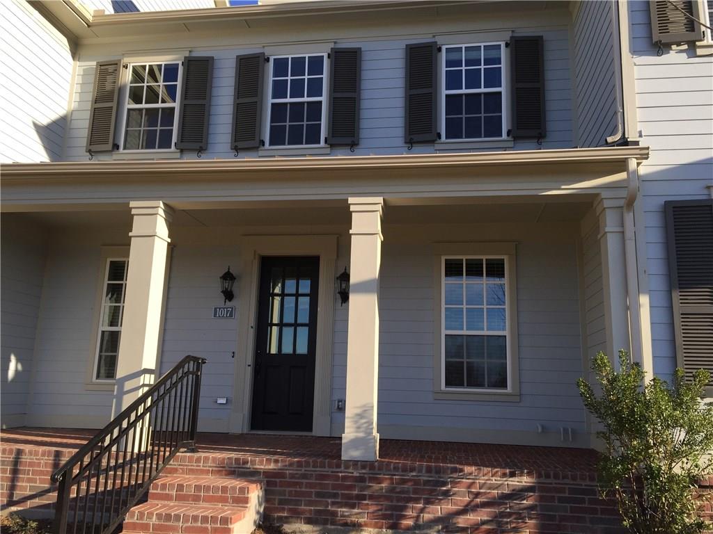 1017 Water Street Carrollton, TX 75007 - Photo 3 of 21 a front view of house with a garden
