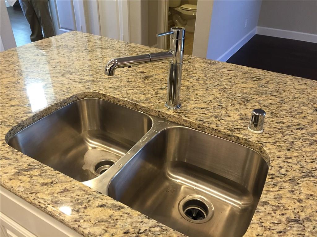 1017 Water Street Carrollton, TX 75007 - Photo 9 of 21 a close view of sink