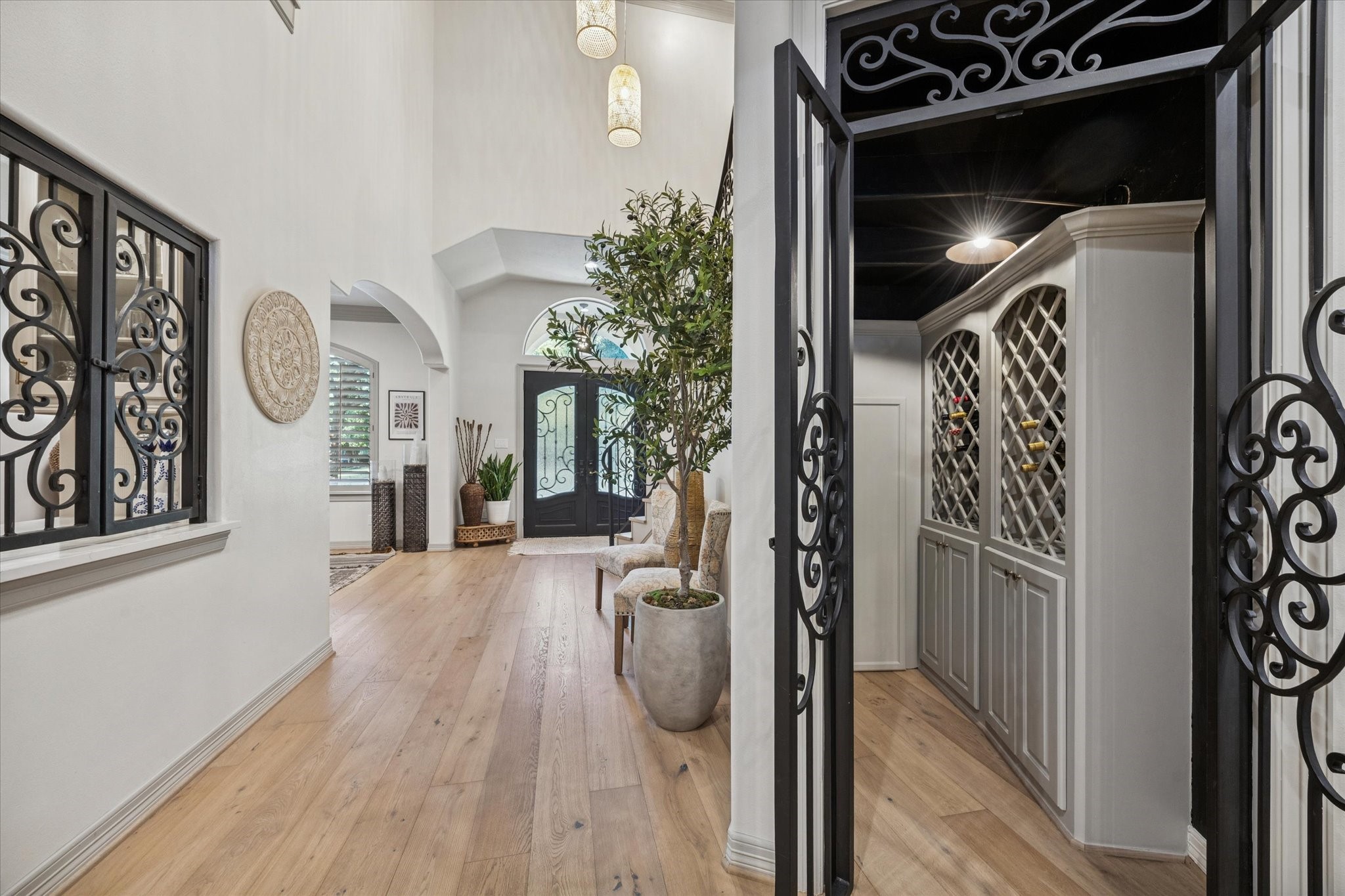 4806 Copper Manor Court Katy, TX 77494 - Photo 8 of 50 a view of a hallway with wooden floor and entryway