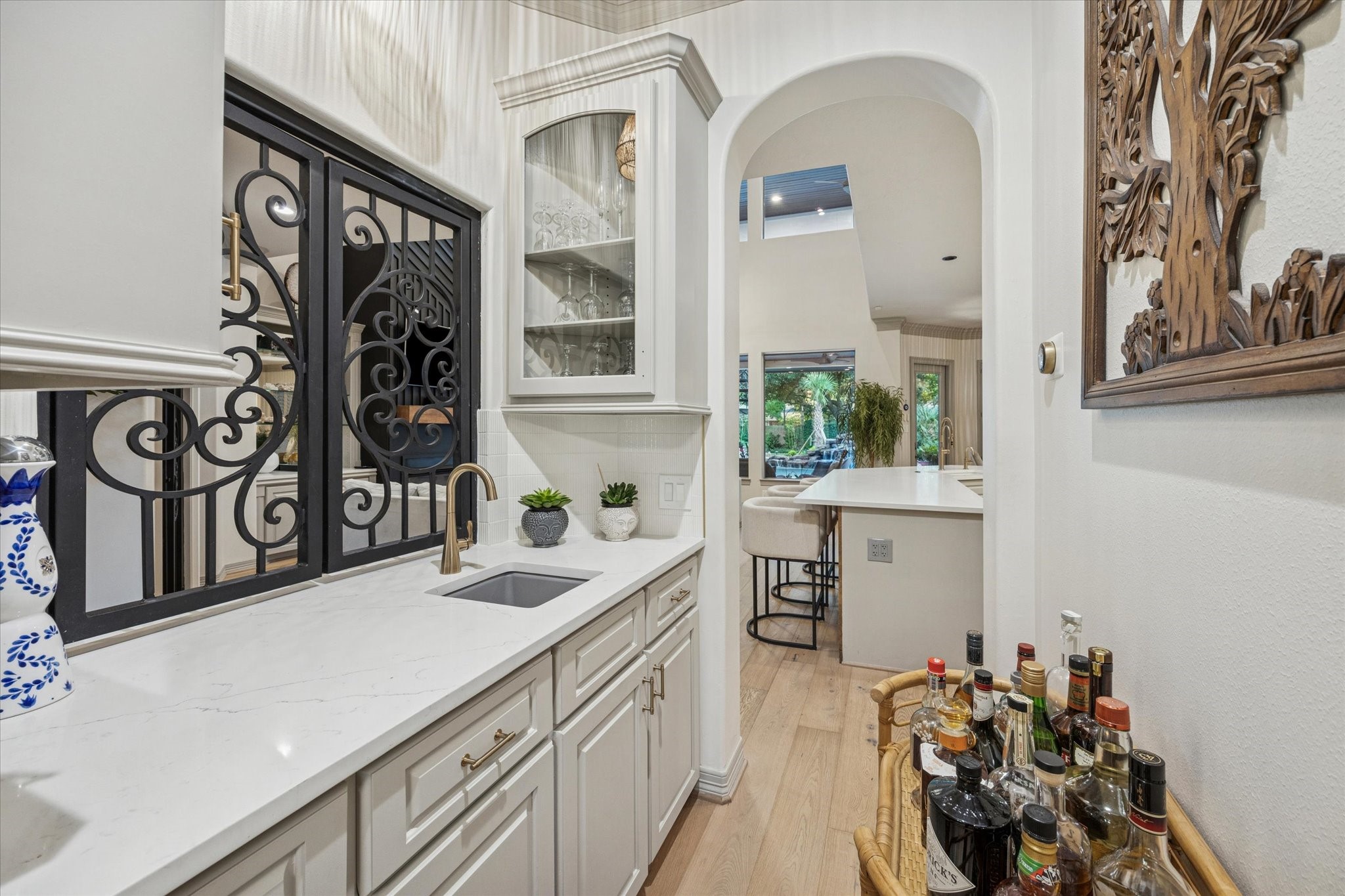 4806 Copper Manor Court Katy, TX 77494 - Photo 9 of 50 a kitchen with a sink cabinets and window