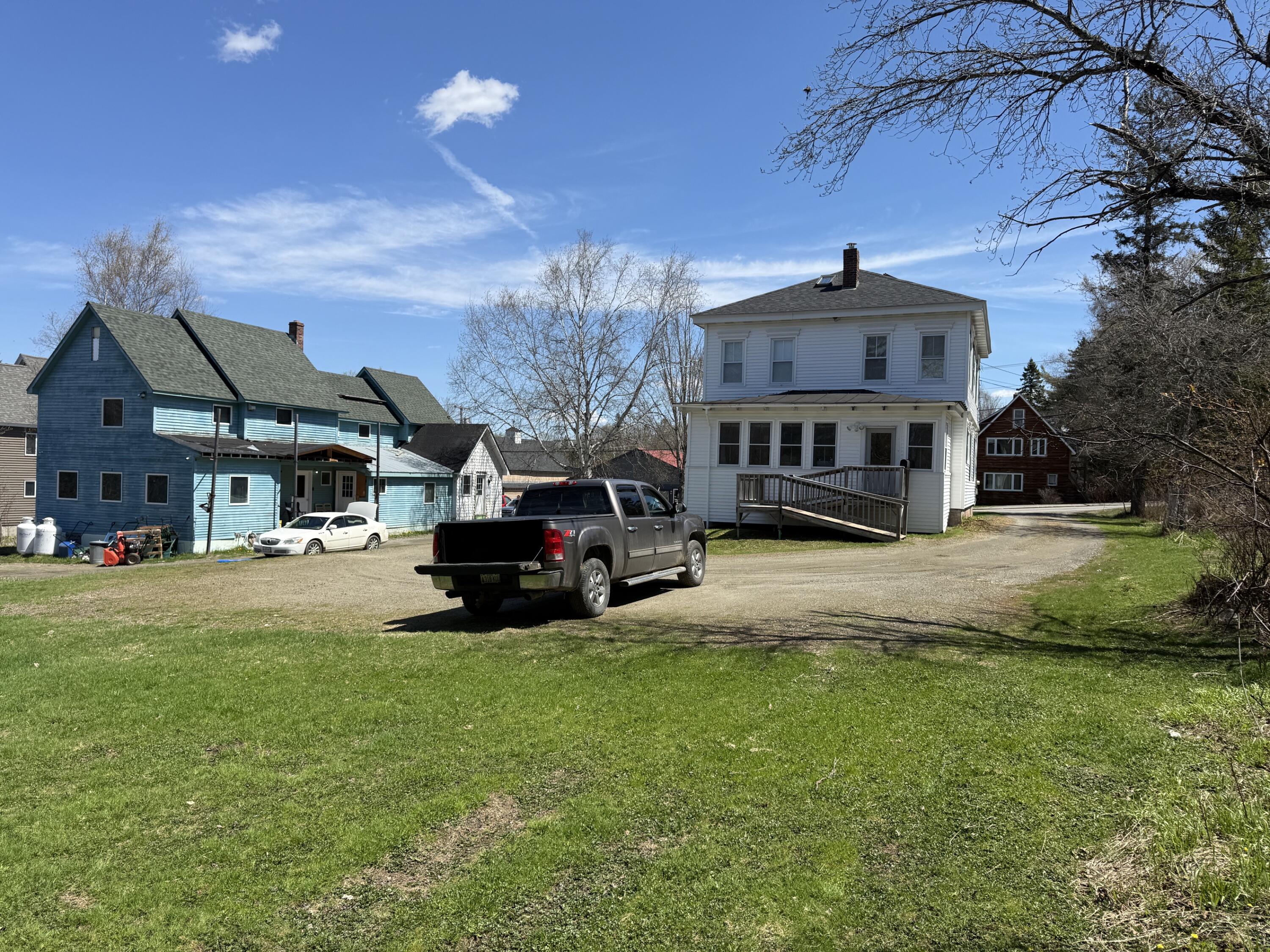 2388 Main Street Rangeley, ME 04970 - Photo 9 of 49 Home - Back Lawn and Parking