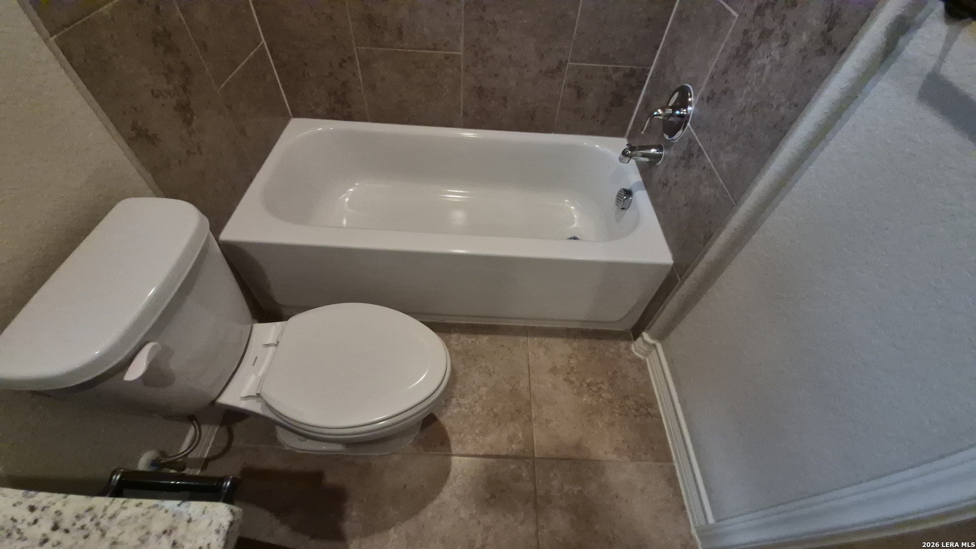 6414 Luglio Lane, Unit 101 San Antonio, TX 78233 - Photo 23 of 23 a bathroom with a sink and toilet