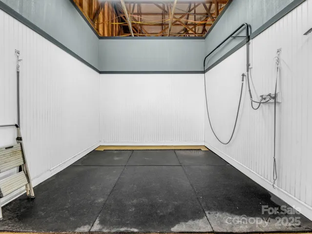 a view of a room with racks on the wall