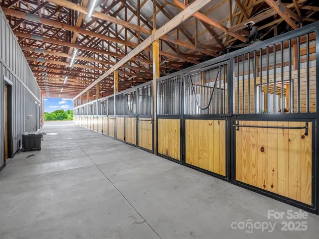 a view of an empty room with stairs