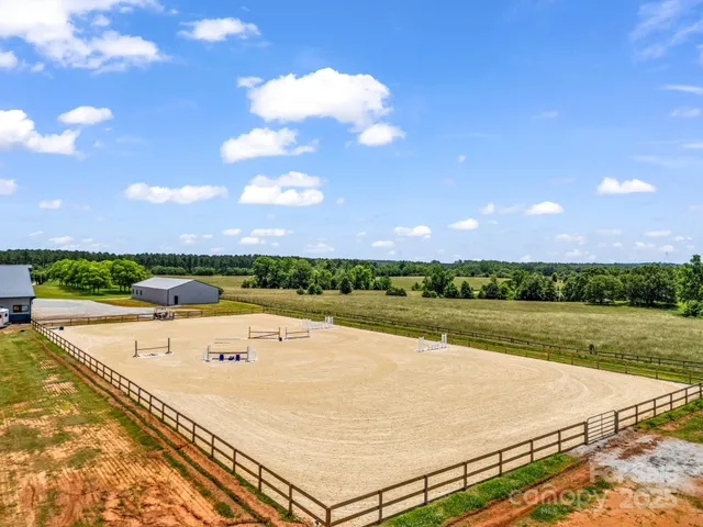 a view of a swimming pool and an outdoor seating