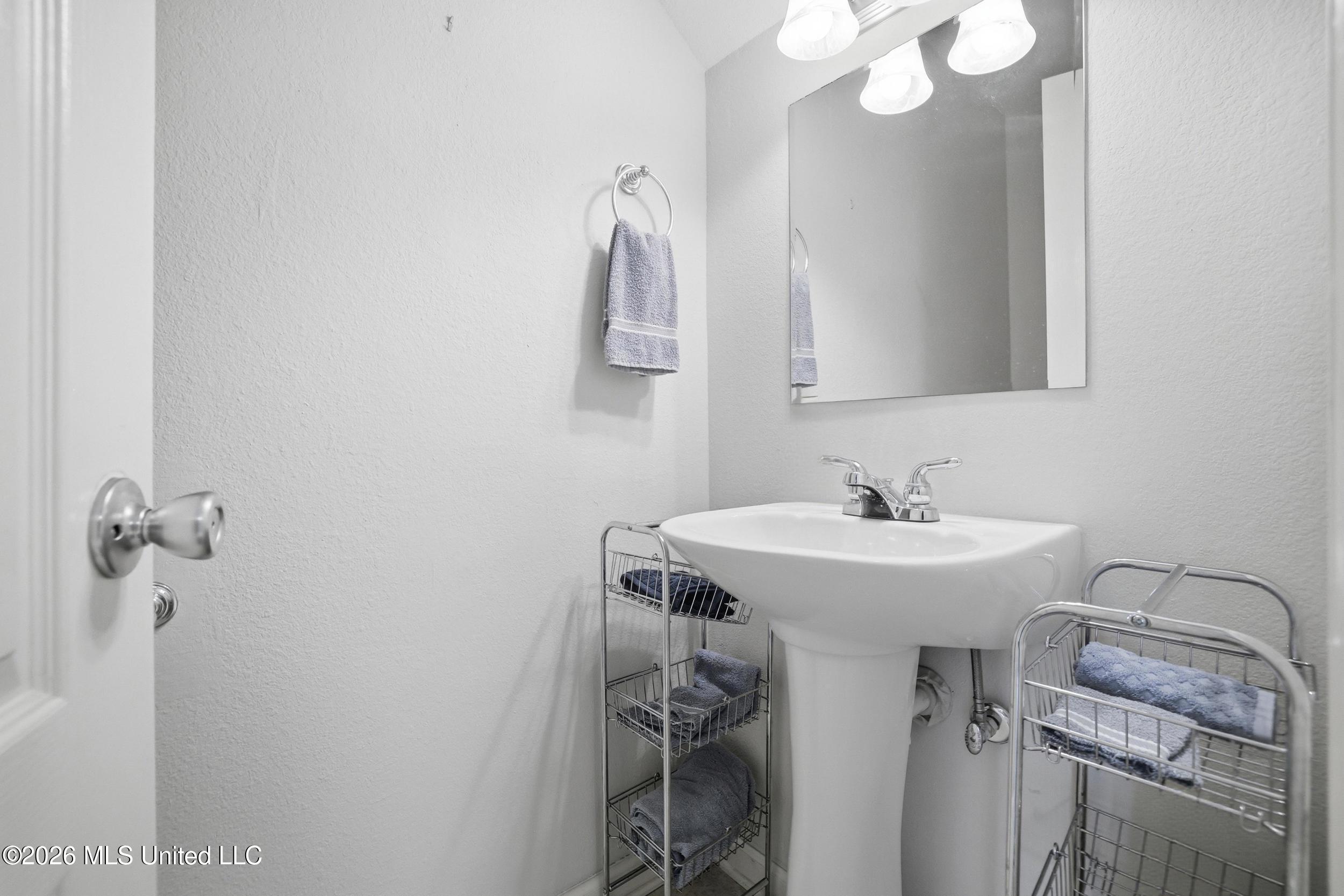 3230 Cumberland Road, Unit 41 Ocean Springs, MS 39564 - Photo 16 of 43 HALF BATH DOWNSTAIRS