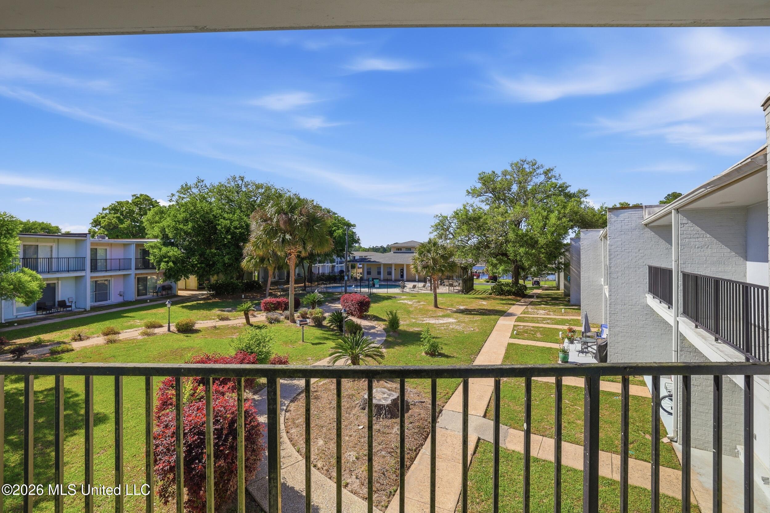 3230 Cumberland Road, Unit 41 Ocean Springs, MS 39564 - Photo 25 of 43 BALCONY VIEW ALL THE WAY TO THE BAYOU