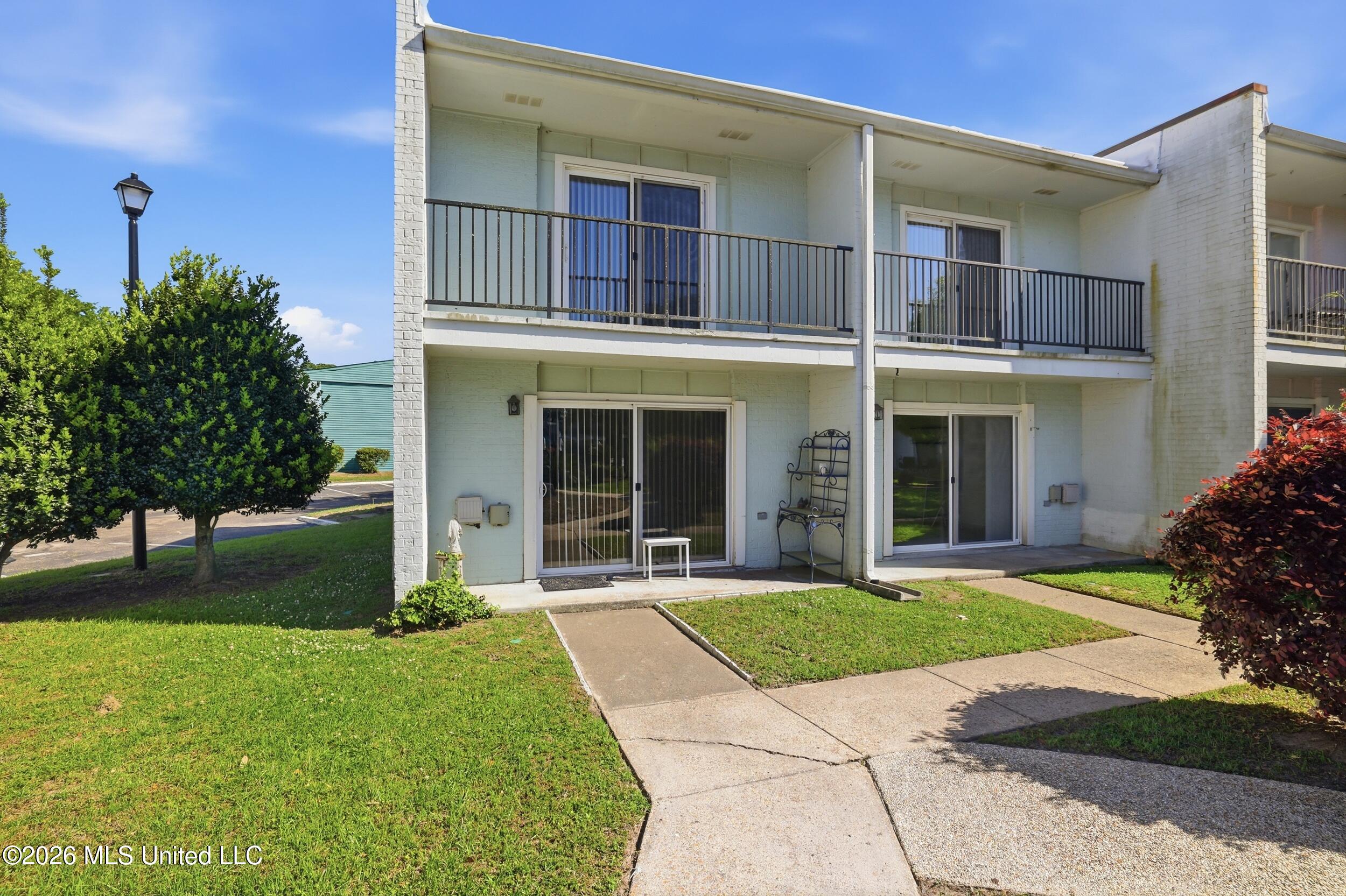 3230 Cumberland Road, Unit 41 Ocean Springs, MS 39564 - Photo 26 of 43 EXTERIOR BACK VIEW OF CONDO