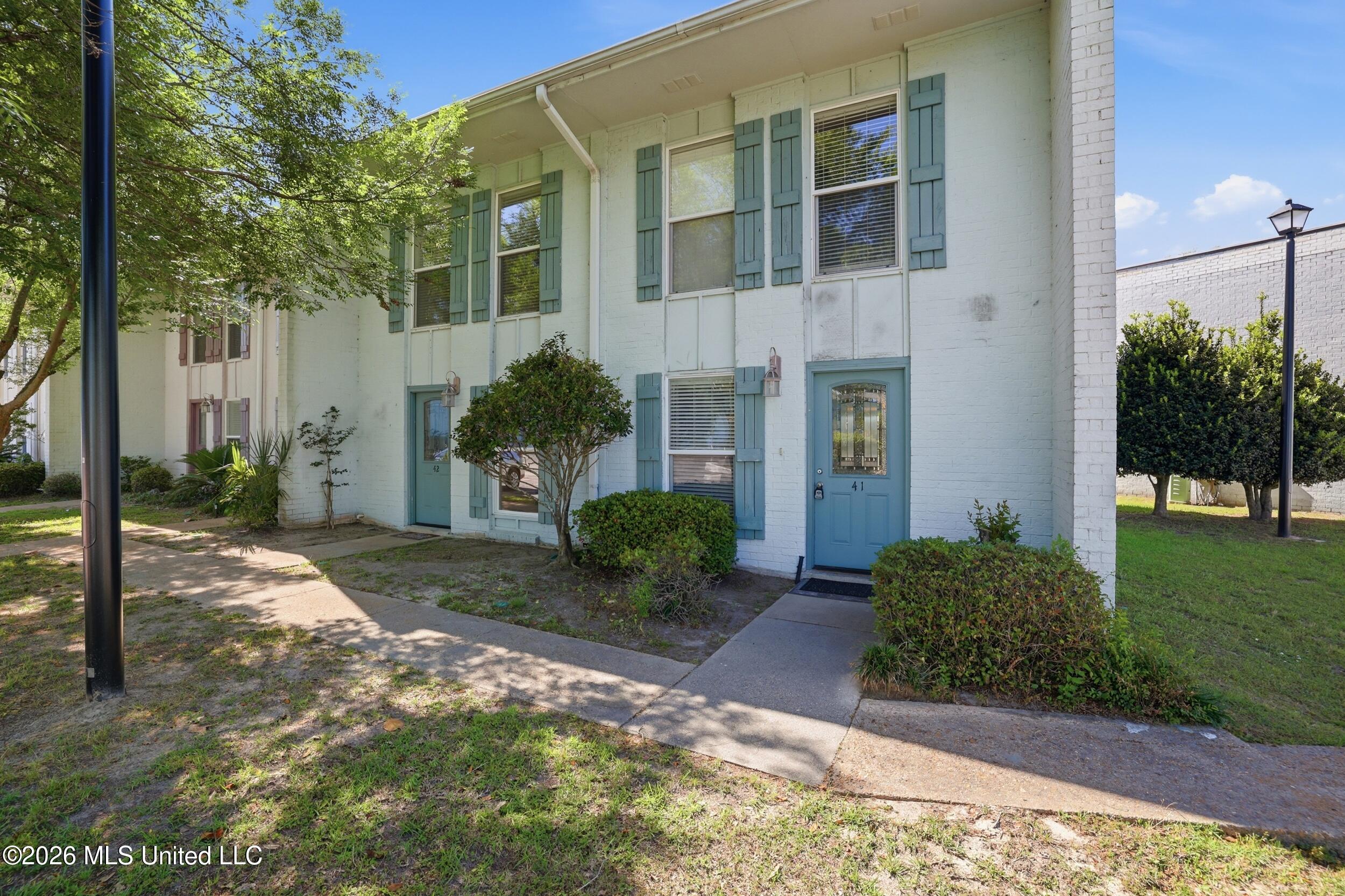 3230 Cumberland Road, Unit 41 Ocean Springs, MS 39564 - Photo 3 of 43 FRONT VIEW DOOR ON END IS 41
