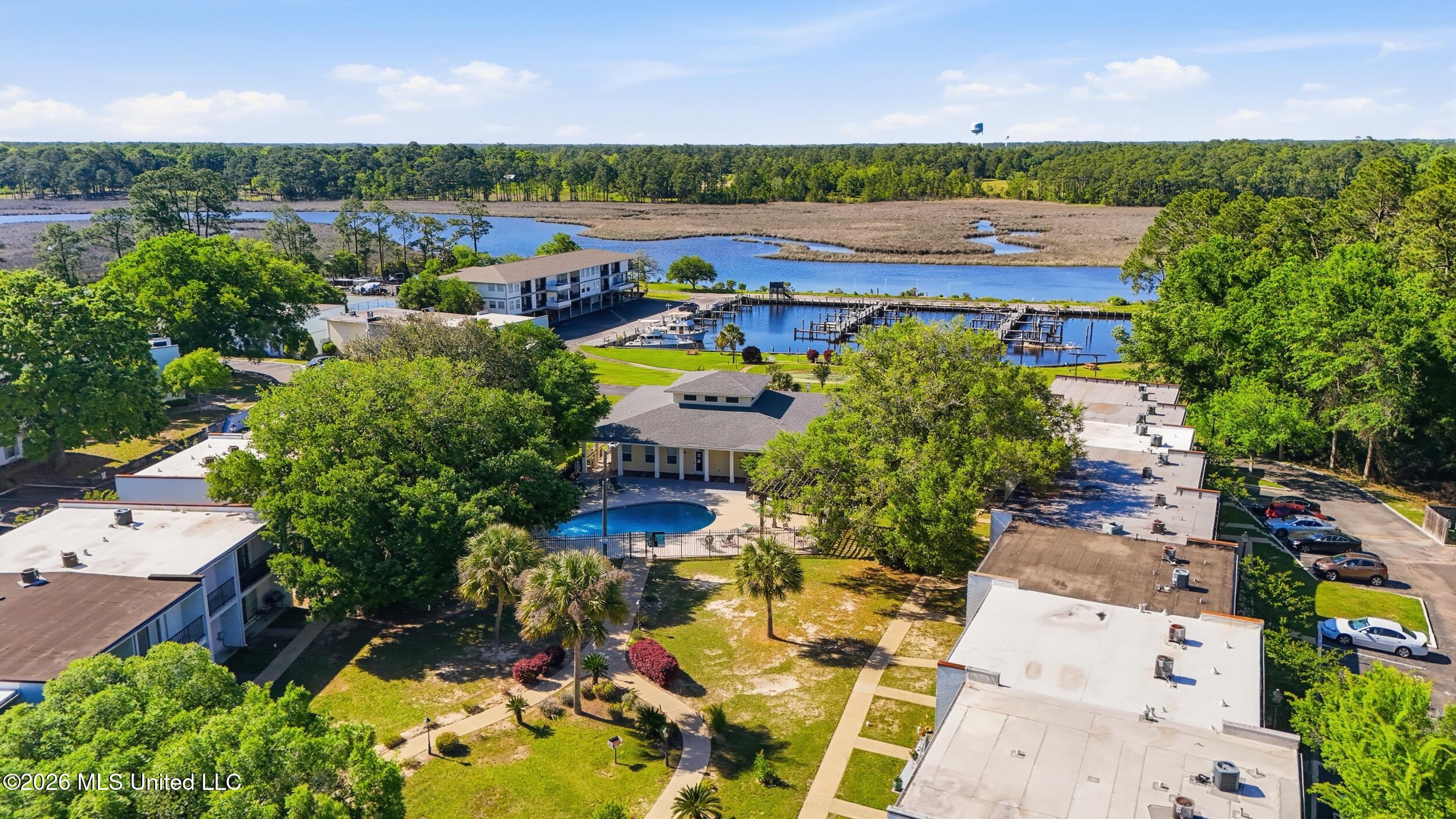 3230 Cumberland Road, Unit 41 Ocean Springs, MS 39564 - Photo 43 of 43 VIEW POOL CLUBHOUSE AND BAYOU