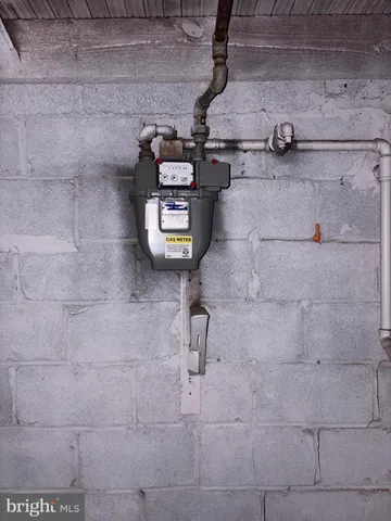a view of a brick house with many windows