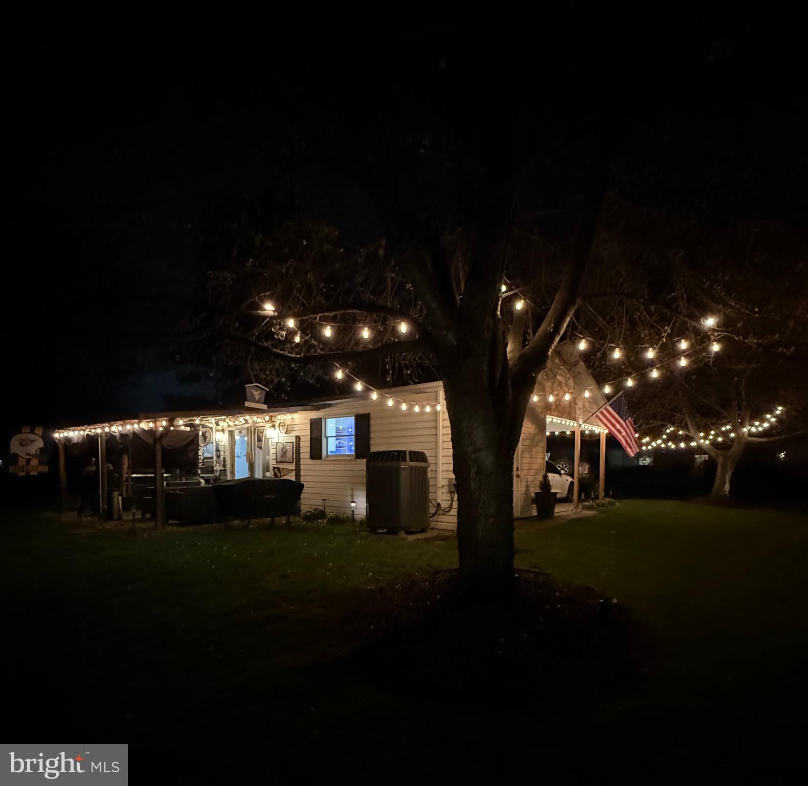 65 South Hummingbird Street Keyser, WV 26726 - Photo 8 of 30 a night view of an outdoor space and a yard