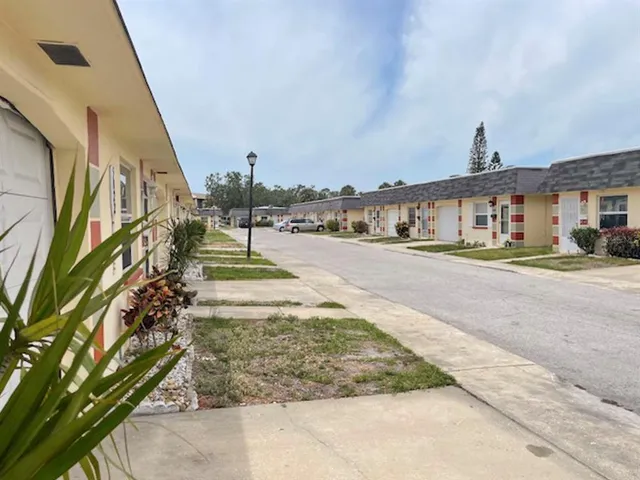 a view of a street in front of a building