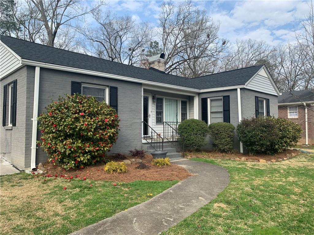 206 Dodd Street Rome, GA 30165 - Photo 1 of 1 a front view of a house with garden