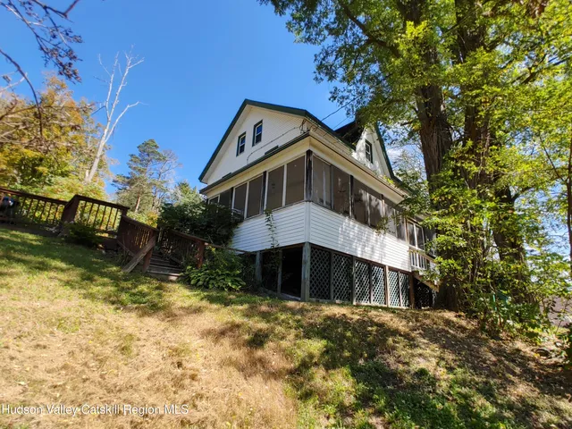 a living room with a couch and a table