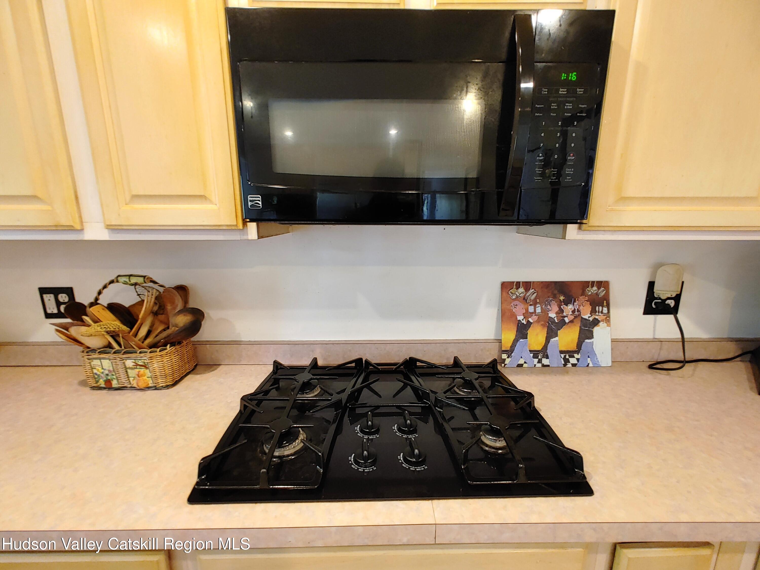 11 Old Turnpike Road Pine Hill, NY 12465 - Photo 24 of 64 a kitchen with a stove and cabinets