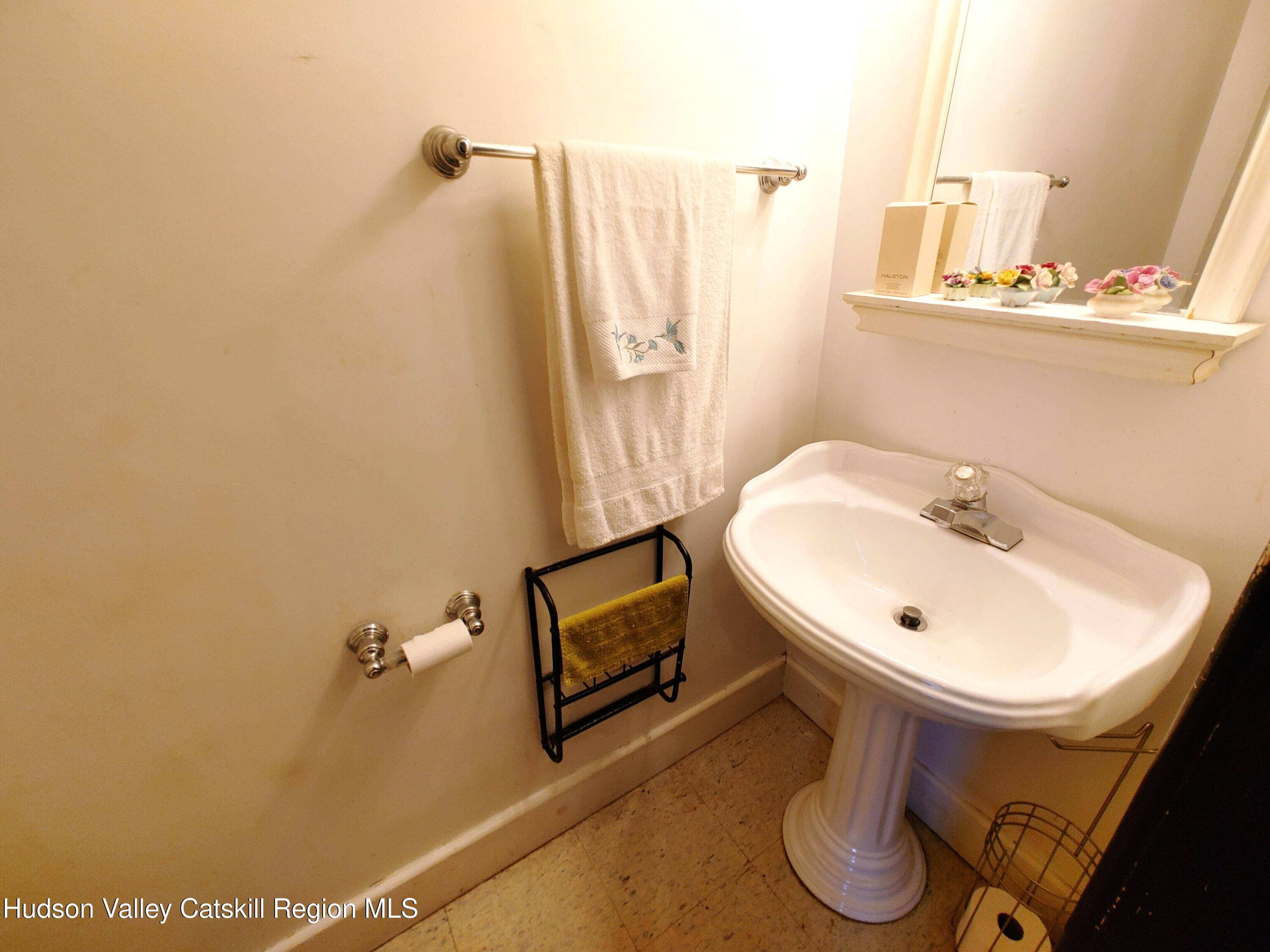 11 Old Turnpike Road Pine Hill, NY 12465 - Photo 31 of 64 a bathroom with a sink and a mirror