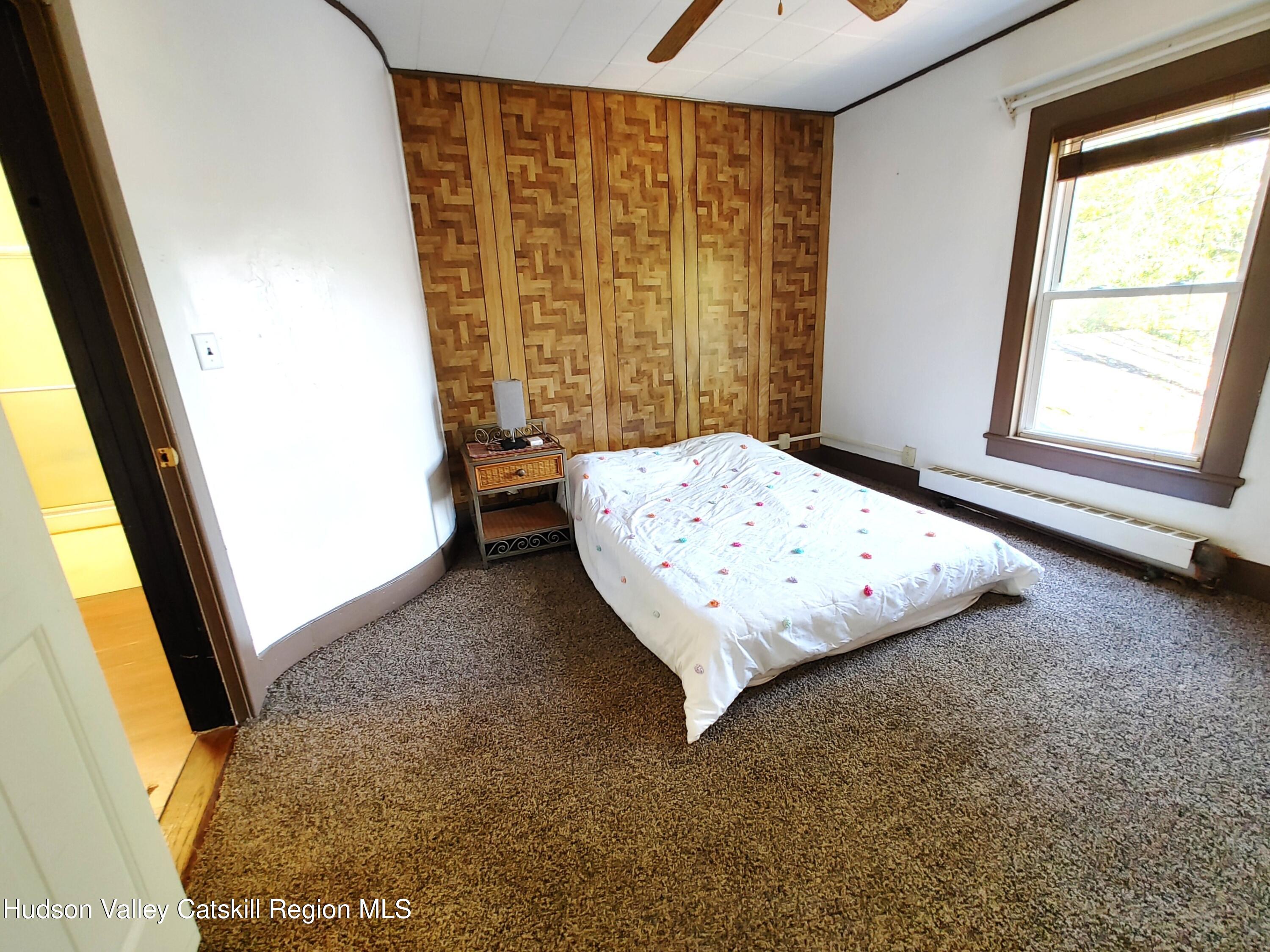 11 Old Turnpike Road Pine Hill, NY 12465 - Photo 41 of 64 a bedroom with a bed and a window