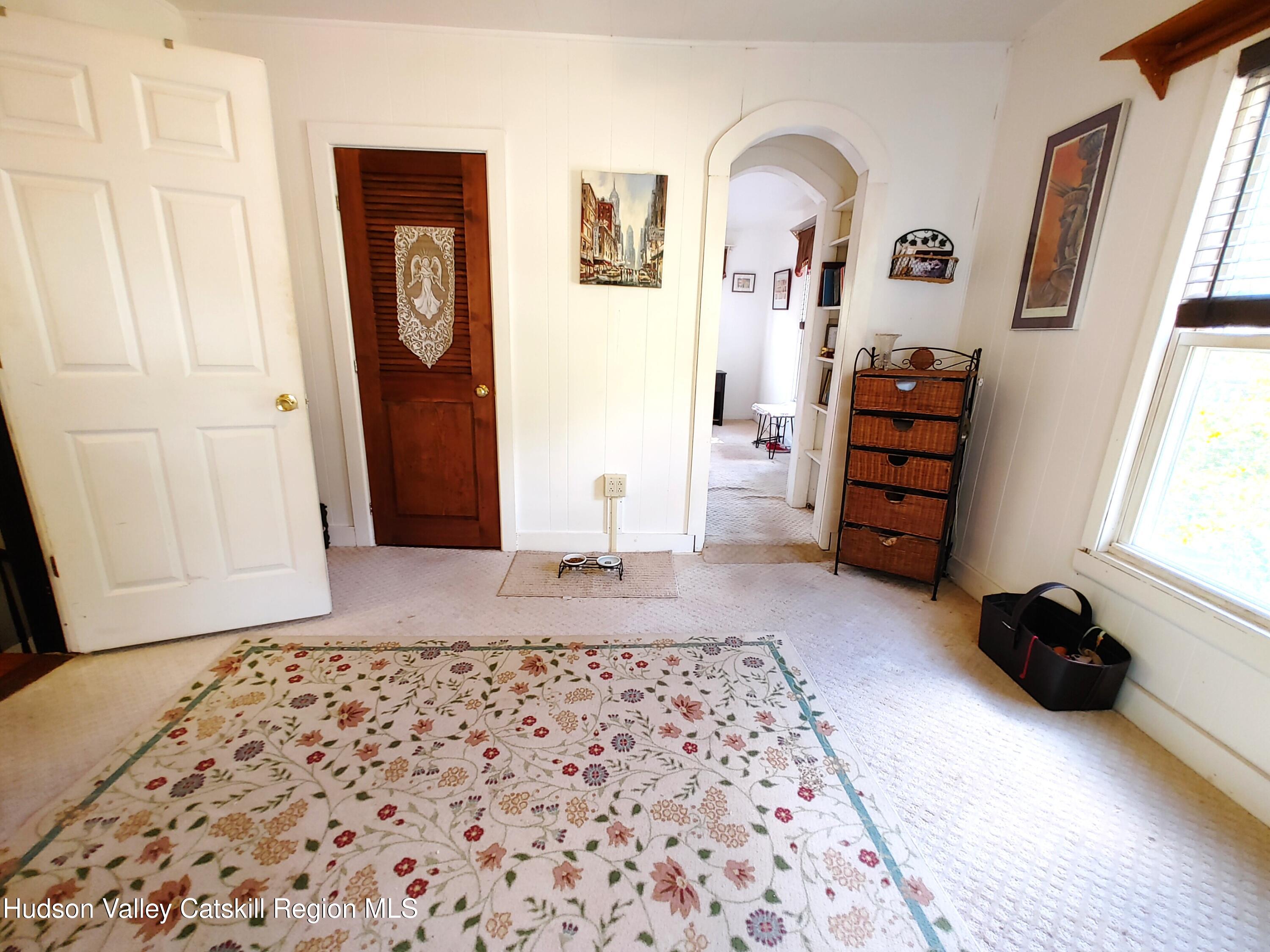 11 Old Turnpike Road Pine Hill, NY 12465 - Photo 46 of 64 a view of a bedroom with wooden floor and closet