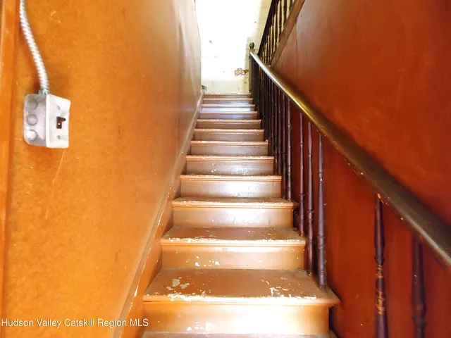 a view of a bathroom with bathtub