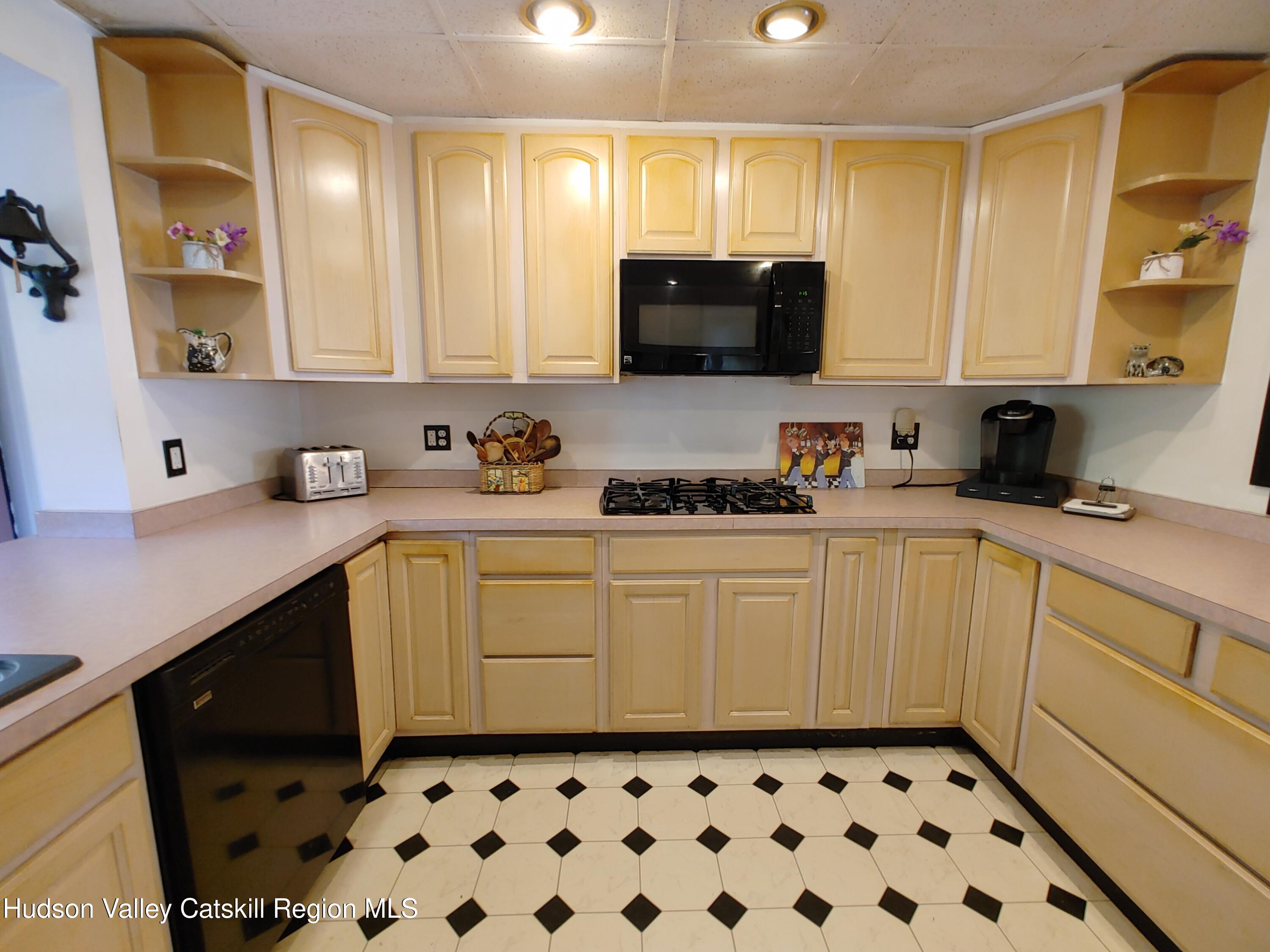 11 Old Turnpike Road Pine Hill, NY 12465 - Photo 5 of 64 a kitchen with a sink a stove and cabinets