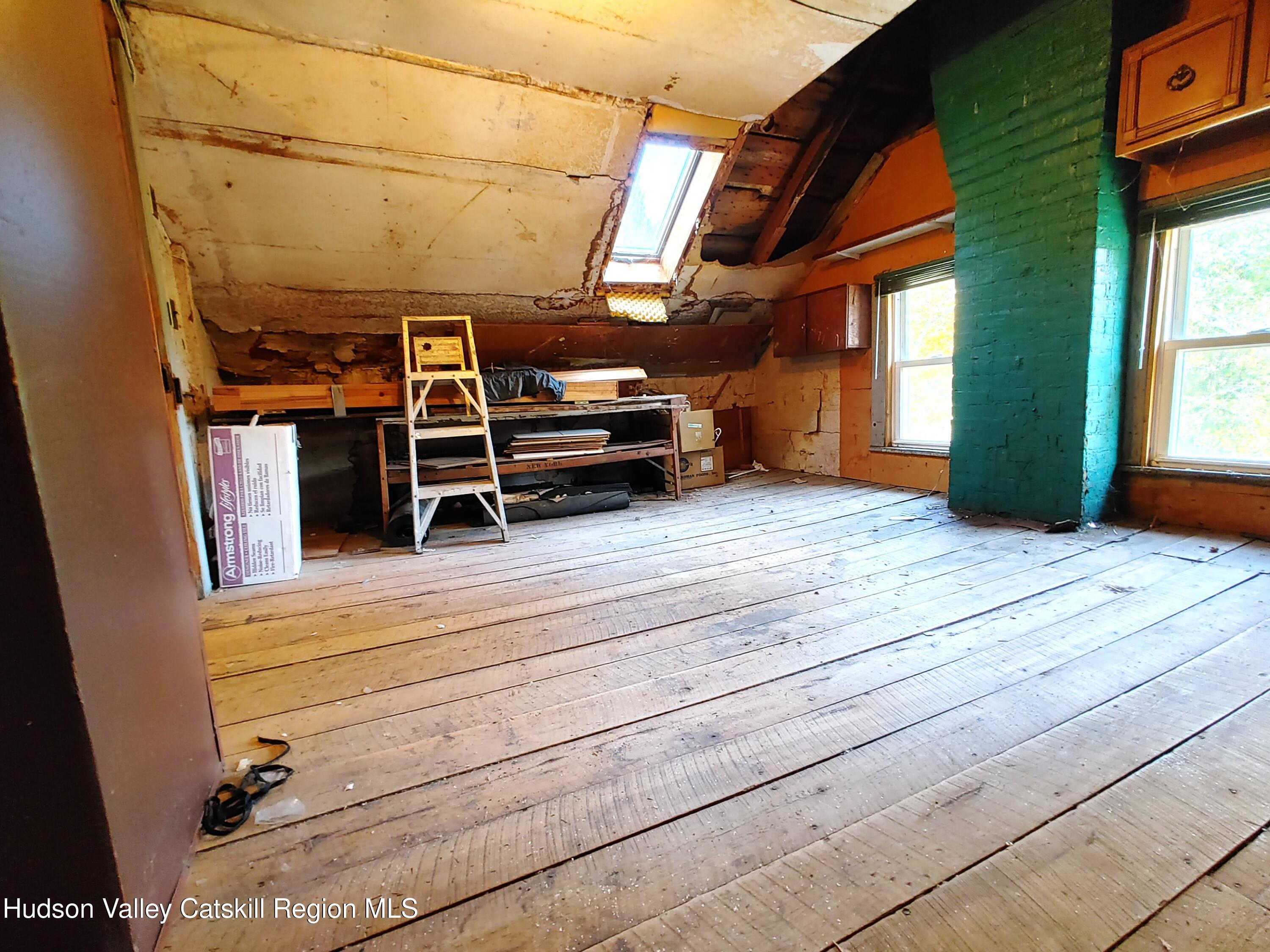 11 Old Turnpike Road Pine Hill, NY 12465 - Photo 54 of 64 a view of room with wooden floor and windows