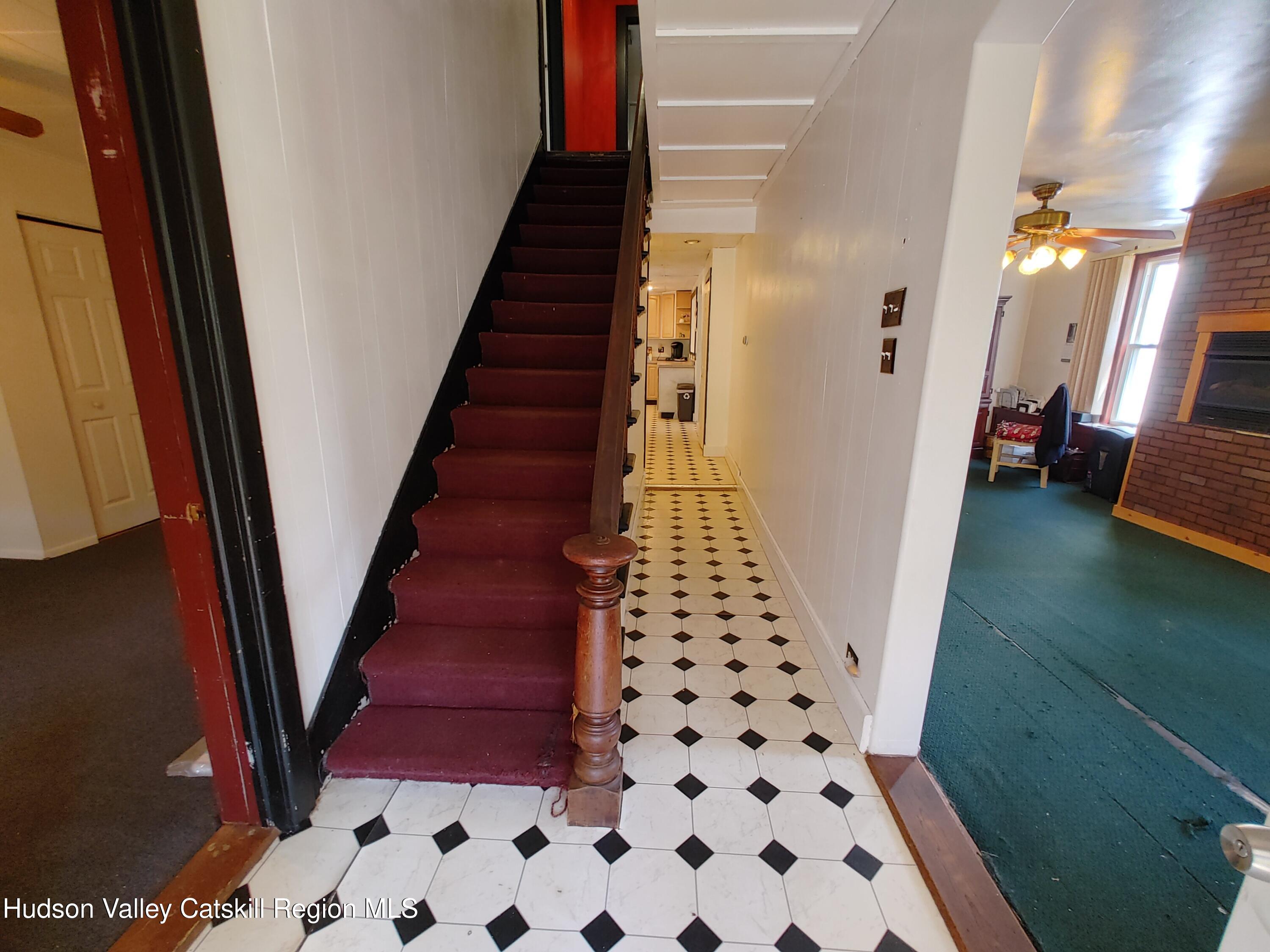 11 Old Turnpike Road Pine Hill, NY 12465 - Photo 7 of 64 a view of a hallway with wooden floor and stairs